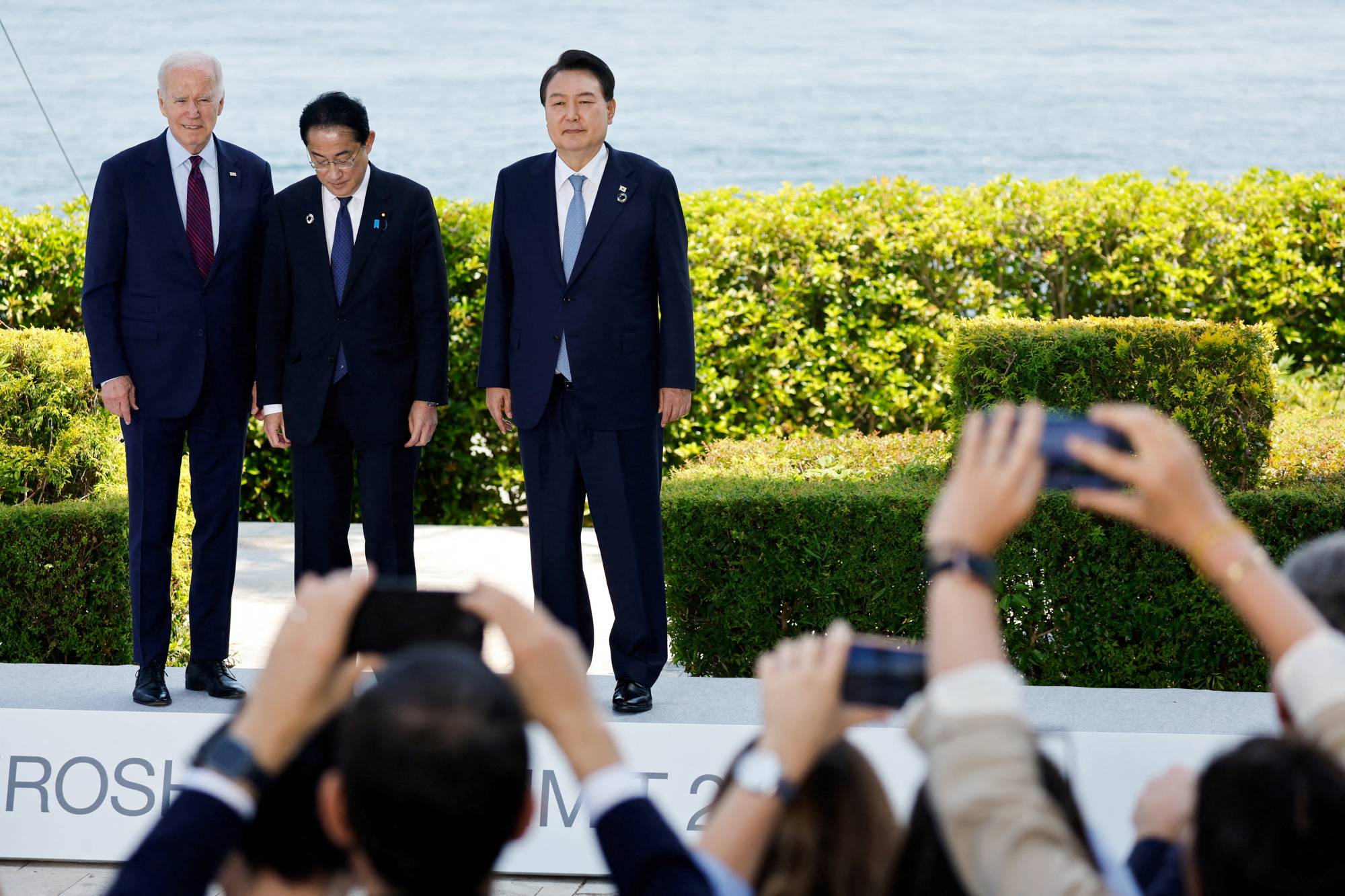 U.S. President Joe Biden, Prime Minister Fumio Kishida and South Korean President Yoon Suk-yeol attend the Group of Seven summit, at the Grand Prince Hotel in the city of Hiroshima last month. | REUTERS</p><p>
