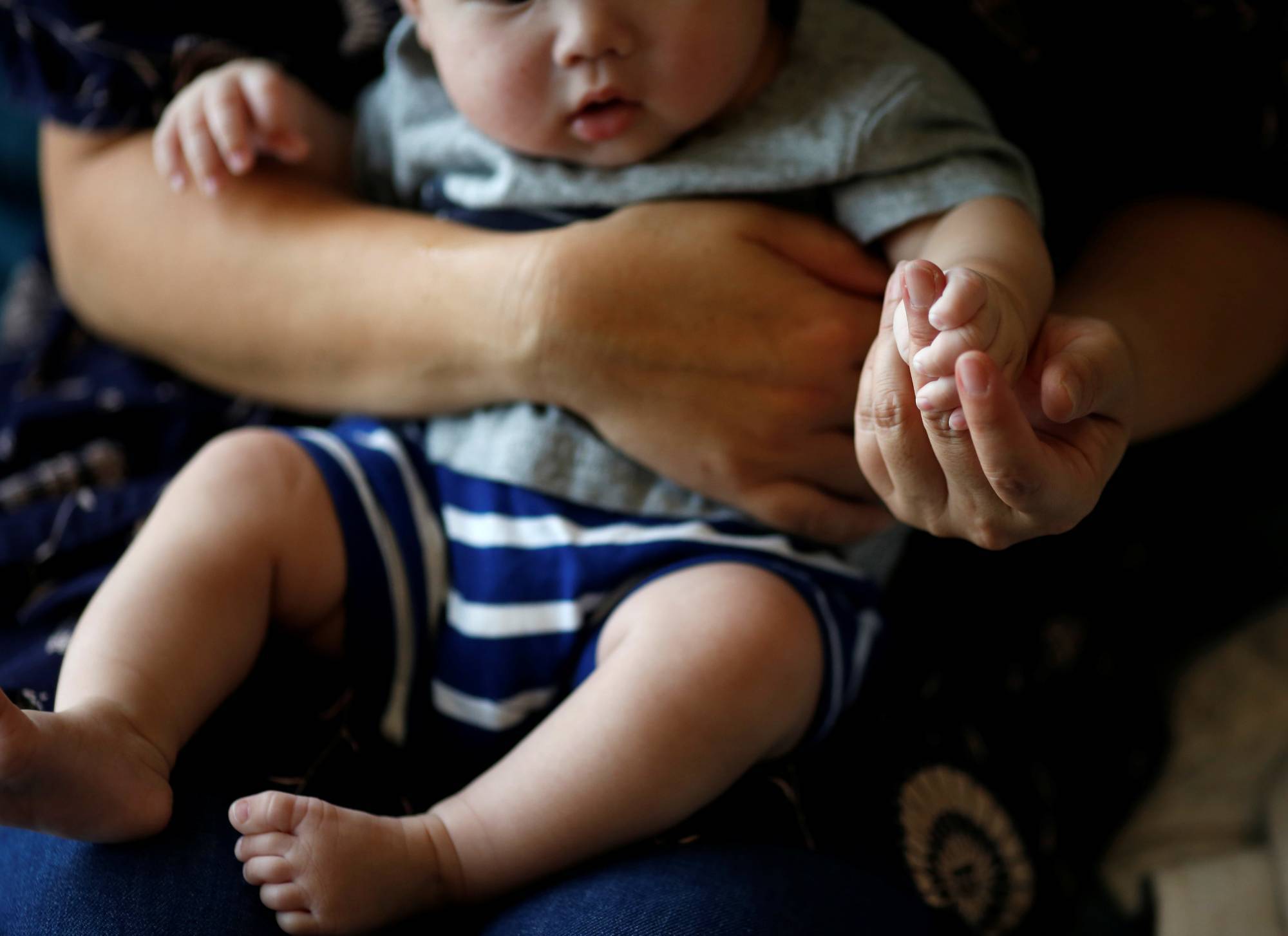 The number of newborns in Japan last year hit a record low of 770,747, down 40,875 from 2021. | REUTERS