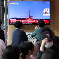 A TV broadcasting a report on a North Korean launch, in Seoul on Wednesday | REUTERS