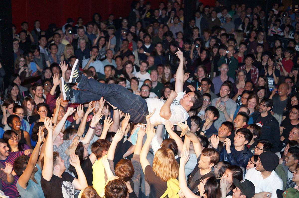 Steven Tanaka crowdsurfs at a Next Music From Tokyo show at Toronto's Lee's Palace in 2014. | COURTESY OF STEVEN TANAKA 