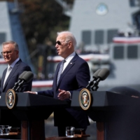 U.S. President Joe Biden, Australian Prime Minister Anthony Albanese and British leader Rishi Sunak deliver remarks on the AUKUS partnership at Naval Base Point Loma in San Diego in March. | REUTERS