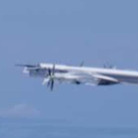 Russia\'s Tu-95 bomber flying above waters near Japan on Tuesday | DEFENSE MINISTRY / VIA KYODO 