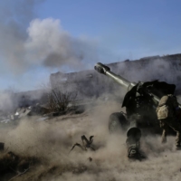 The world is undergoing a trio of crises: The war in Ukraine, climate change and an uncertain future with the widespread introduction of artificial intelligence into our daily lives. | REUTERS 