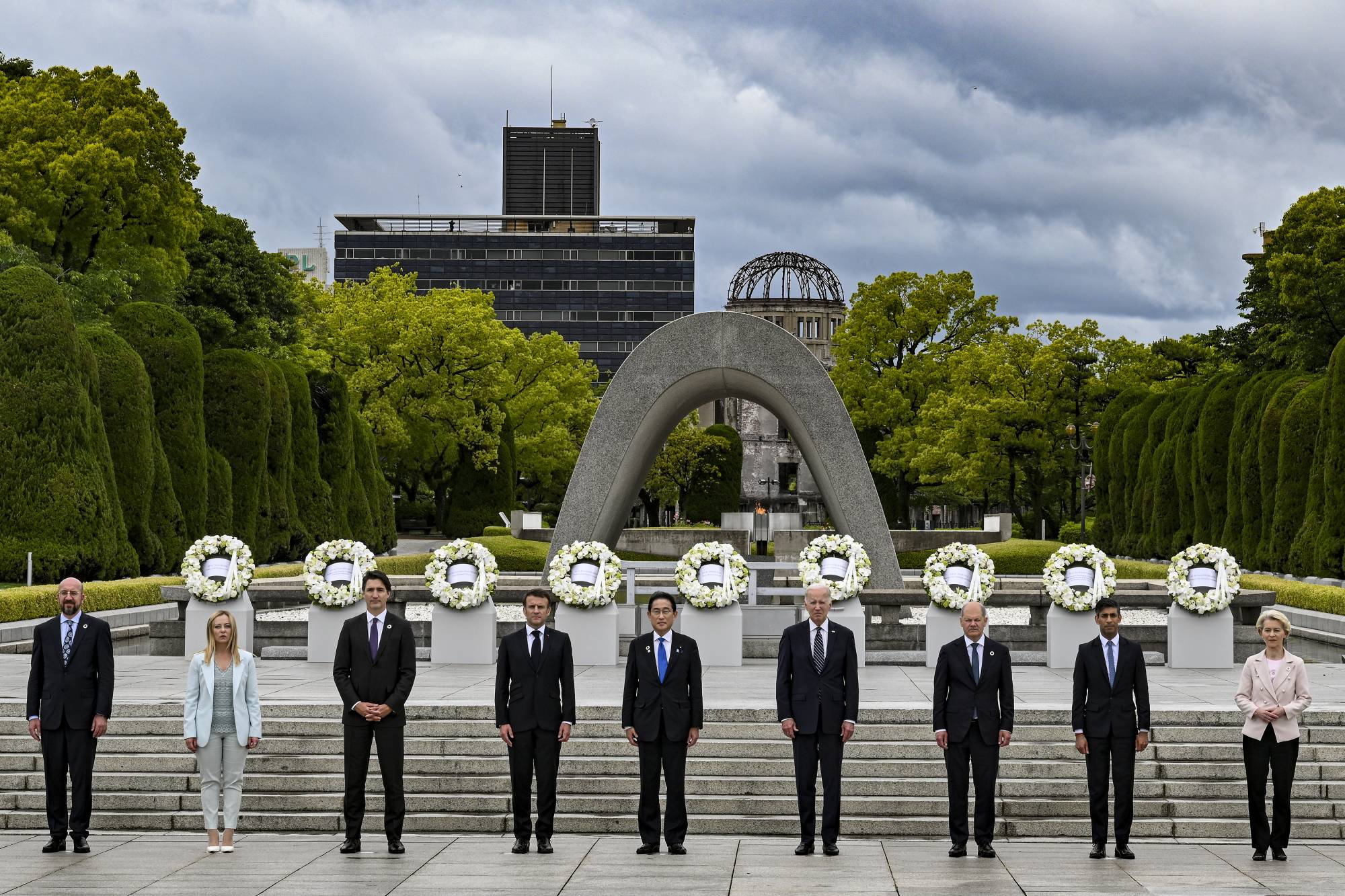 World leaders pose for a group photo at the Hiroshima Peace Memorial on May 19, the first day of the 49th Group of Seven Summit. | KENNY HOLSTON / THE NEW YORK TIMES