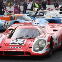 A driver drives the Porsche 917K, which won the 24 Hours of Le Mans in 1970, during a parade dedicated to the cars that have won the prestigious race. | AFP-JIJI