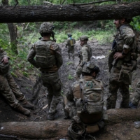 Soldiers with Ukraine’s 3rd Separate Assault Brigade on the the front lines, south of Bakhmut, Ukraine on June 9. | TYLER HICKS / THE NEW YORK TIMES