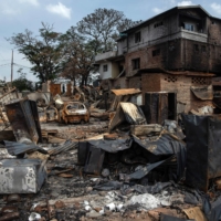 The burned remains of a Kuki locality, Haokip Veng, in Imphal, the capital of the Indian state of Manipur, on June 1. An outburst of ethnic hatred, led by the local government, has fractured an ancient kingdom and turned neighbors into enemies. | SAUMYA KHANDELWAL / THE NEW YORK TIMES