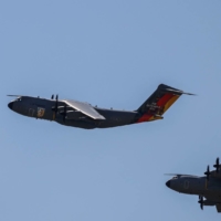 Two Airbus A400M aircraft from the German military approach during the Air Defender exercise in Germany on Monday. | AFP-JIJI