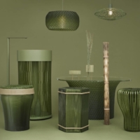 Clockwise from bottom left: Kazuki Fujiwara’s Ami stool; James Kaoru Bury’s Tachiwaki washbasin; Ryo Suzuki’s Sori lampshade; Fujiwara’s Ami lampshade; Shoichi Yokohama’s Chigusa stool; Shinnosuke Harada’s Taba lighting; Moritaka Tochigi’s Yocell stool; and Harada x Tochigi’s Kohshi flower stand on Suzuki’s Mukuri table. | COURTESY OF TATAMI REFAB / HONOKA LAB

