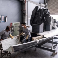Workers repair a coast guard patrol boat whose nose had been sheared off at sea by a Chinese ship, in Pingtung City, Taiwan, in October 2022.  | LAM YIK FEI / THE NEW YORK TIMES