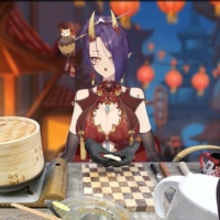 Using a blue screen, an anime avatar and her real hands (visible in black gloves at the far end of the countertop), VTuber OniGiri prepares meals live in front of her online community. | COURTESY OF GEEXPLUS