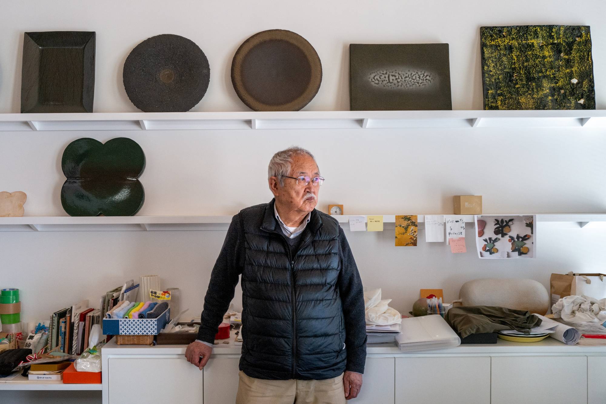 Fujiwo Ishimoto, 81, stands in his Mustakivi store in Dogo, Ehime Prefecture. The designer returned to Japan after a successful 50-year stint abroad.  | LANCE HENDERSTEIN