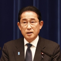 Prime Minister Fumio Kishida speaks during a news conference in Tokyo on Tuesday.  | BLOOMBERG 