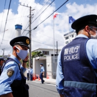 Police officers in Tokyo in 2021 | REUTERS