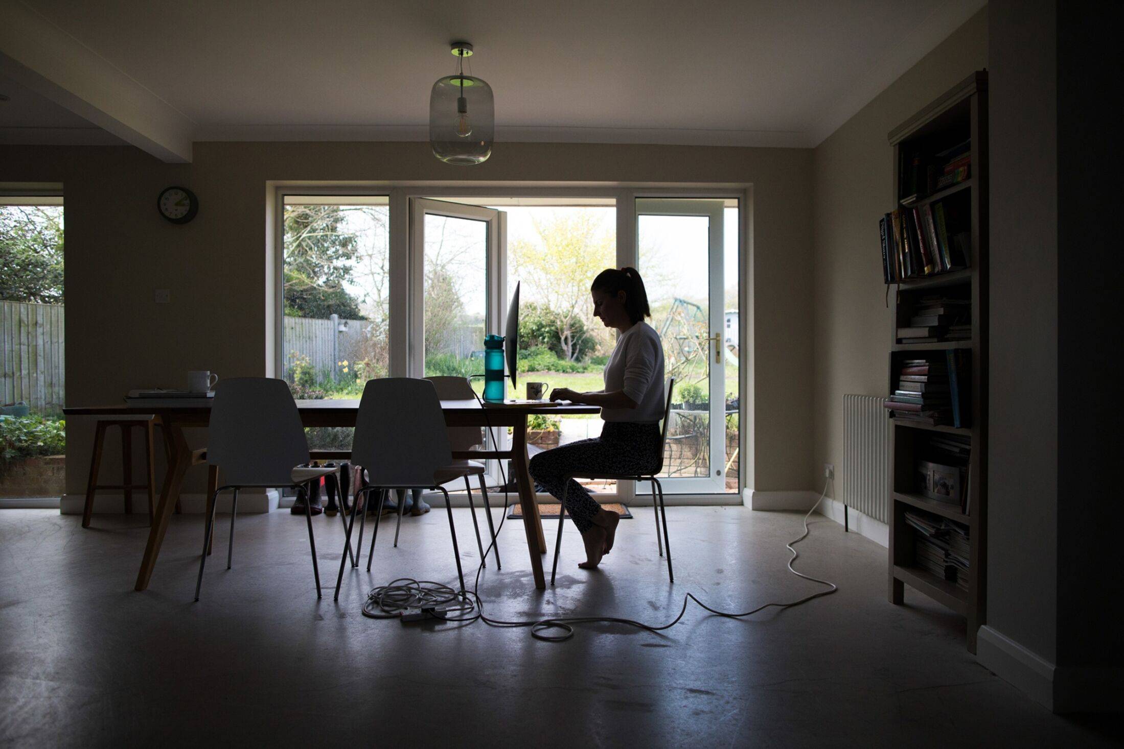 While remote workers don’t want to give up flexibility, leaders want teams back to boost collaboration and avoid a productivity slump. | BLOOMBERG