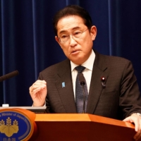 The government of Prime Minister Fumio Kishida has so far not explained how it is going to finance the changes needed to boost the country’s birthrate and its national defense. | POOL / VIA AFP-JIJI