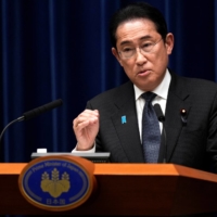 Prime Minister Fumio Kishida speaks during a news conference in Tokyo on Tuesday.  | POOL / VIA REUTERS 