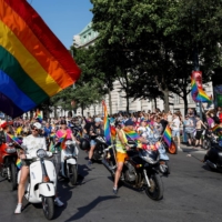 People celebrate LGBTQ rights at the annual pride parade in Vienna on Saturday.   | REUTERS