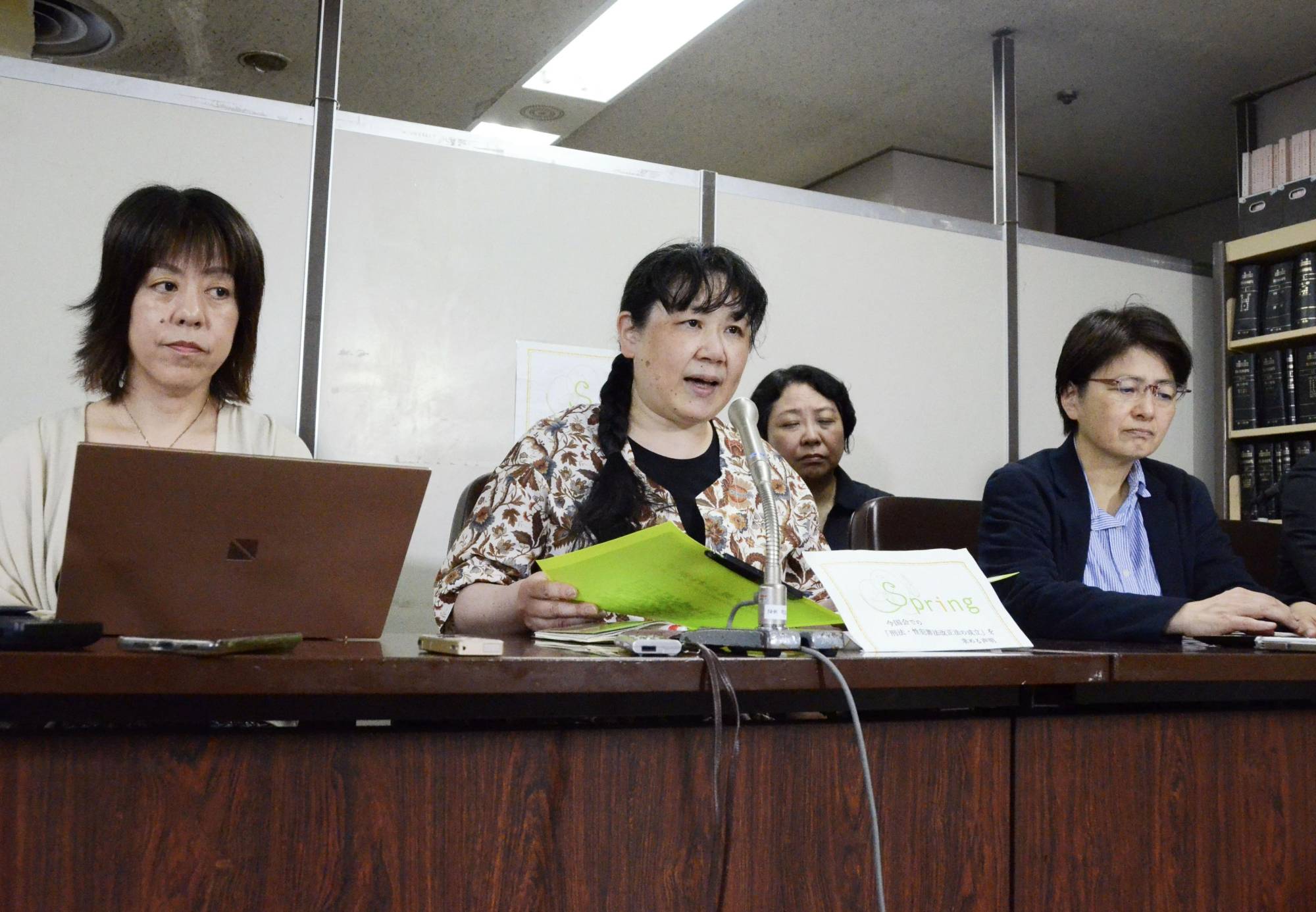 Member of the nonprofit organization Spring, which campaigns for revisions to sex crime laws, speak to reporters in Tokyo on June 2. | KYODO