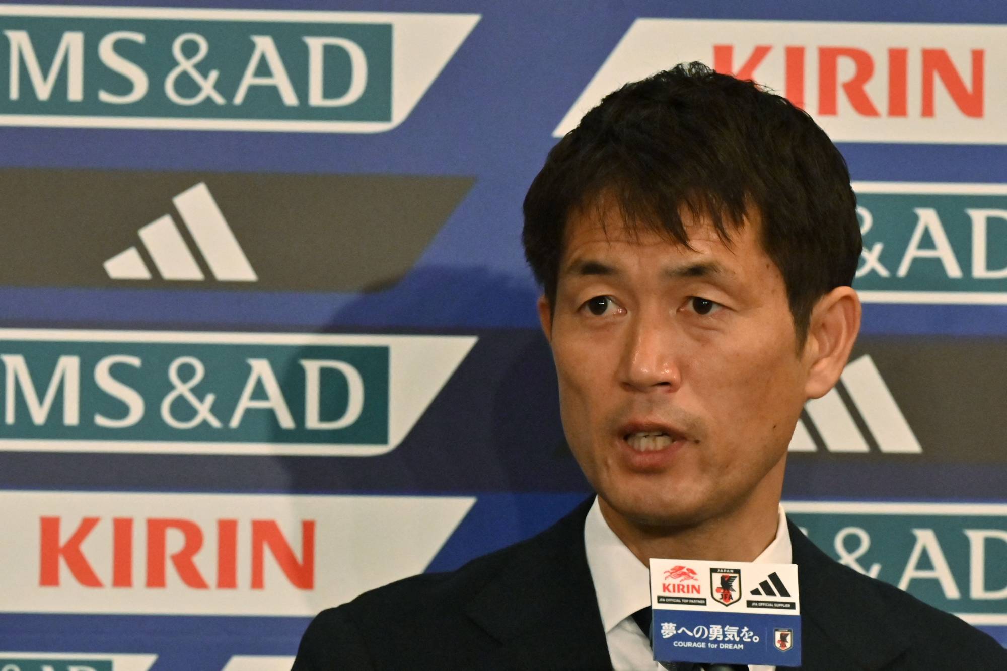 Nadeshiko Japan head coach Futoshi Ikeda discusses his selections for the 2023 FIFA Women's World Cup at a news conference on June 13. | AFP-JIJI