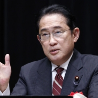 Prime Minister Fumio Kishida speaks at Waseda University in Tokyo on Sunday. | BLOOMBERG