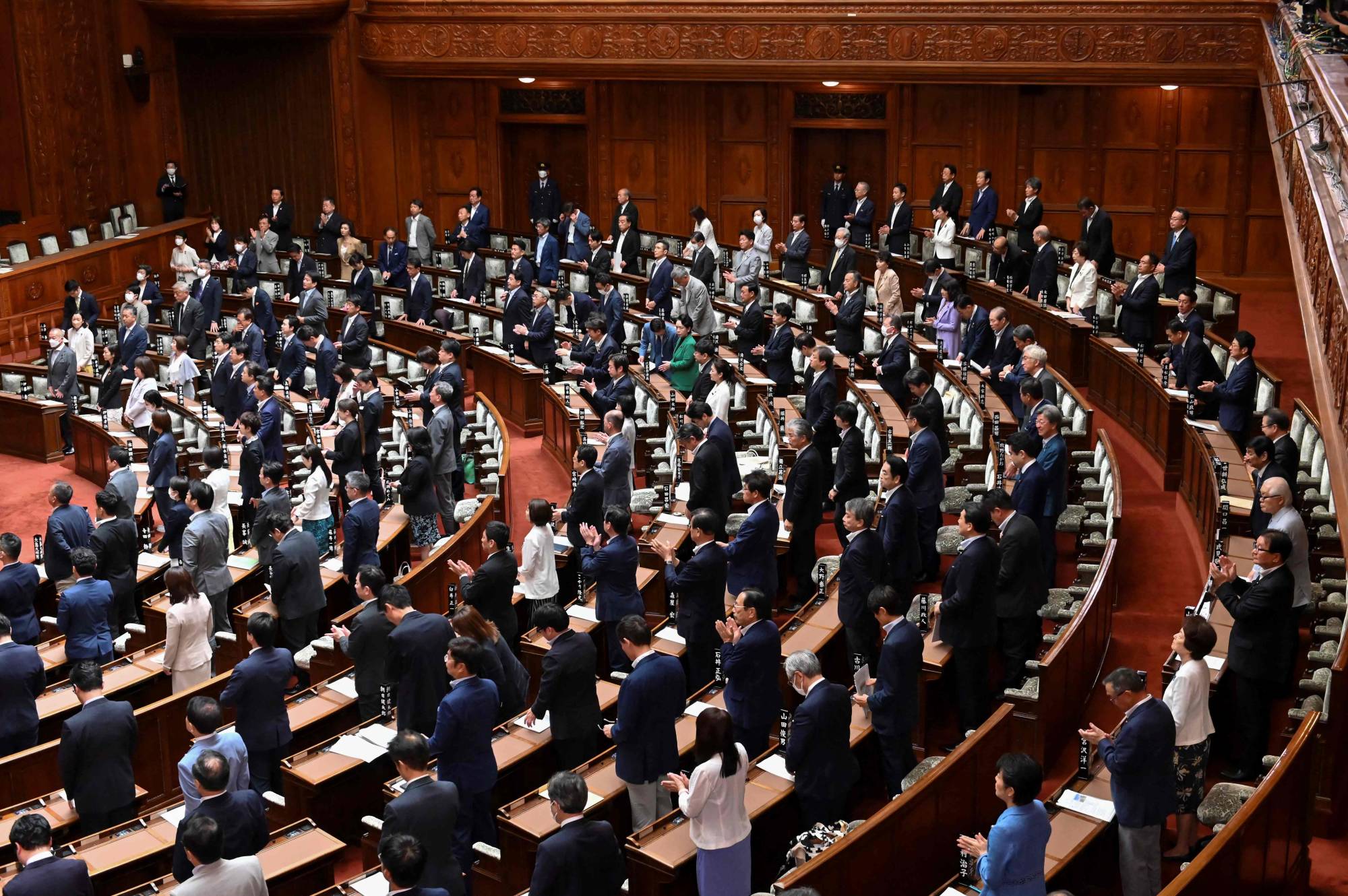 Lawmakers vote on a bill to revise the Penal Code at the House of Councilors in Tokyo on Friday. | AFP-JIJI
