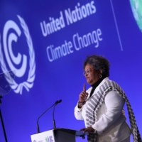 Barbados Prime Minister Mia Mottley delivers a speech at COP26 in Glasgow in November 2021. | WPA / POOL / VIA GETTY IMAGES
