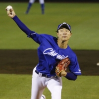 Hiroto Takahashi pitches against the Eagles in Sendai on Wednesday. | KYODO