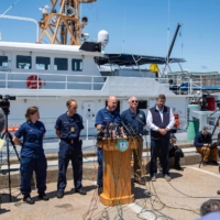 U.S. Coast Guard Captain Jamie Frederick speaks to reporters about the search efforts for the OceanGate submersible that went missing near the wreck of the Titanic, at Coast Guard Base in Boston on Wednesday. | AFP-JIJI