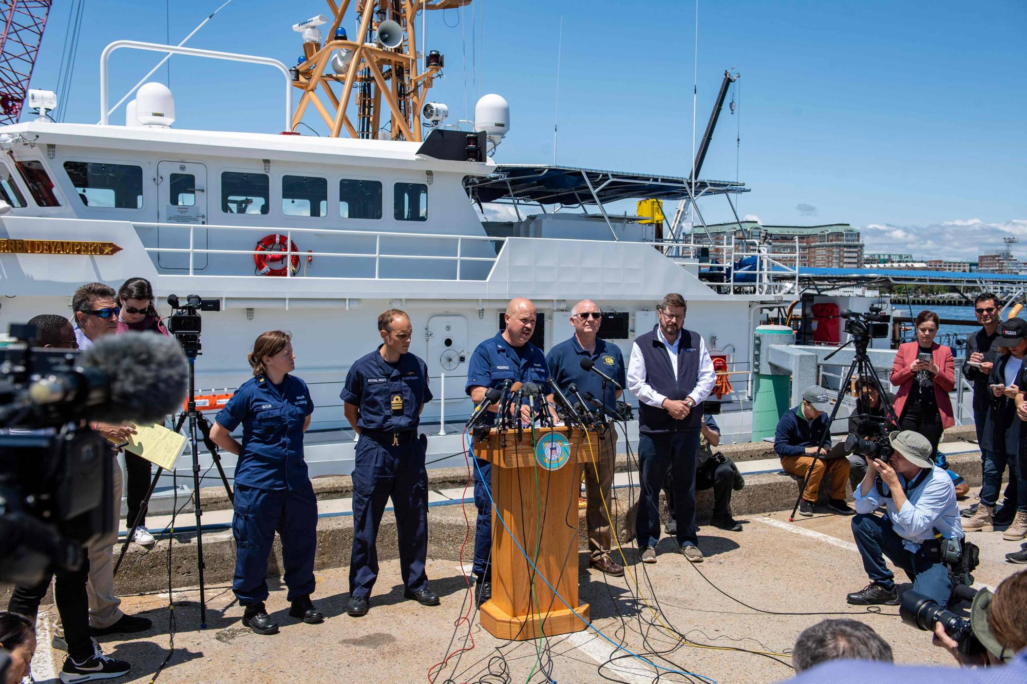 U.S. Coast Guard Captain Jamie Frederick speaks to reporters about the search efforts for the OceanGate submersible that went missing near the wreck of the Titanic, at Coast Guard Base in Boston on Wednesday. | AFP-JIJI