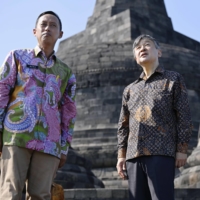 Emperor Naruhito (right) visits Borobudur temple, a UNESCO World Heritage-listed site on Java Island, Indonesia, on Thursday. | KYODO