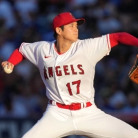 Angels starter Shohei Ohtani pitches against the Dodgers at Angel Stadium in Anaheim, California, on Wednesday. | USA TODAY / VIA REUTERS