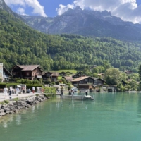 Tourists roam the location for \"Crash Landing on You\" in Lake Brienz, Iseltwald. | BLOOMBERG