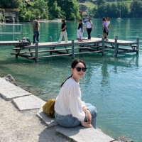 Young-ah Lee, 30, came to Iseltwald to visit a prized location from the TV series \"Crash Landing on You\" on a trip to Europe. Photographer: SUNNY KIM/Bloomberg | BLOOMBERG