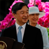 Emperor Naruhito and Empress Masako during a news conference with Indonesian President Joko Widodo at the Bogor Botanical Gardens in Bogor on Monday. | POOL / VIA AFP-JIJI