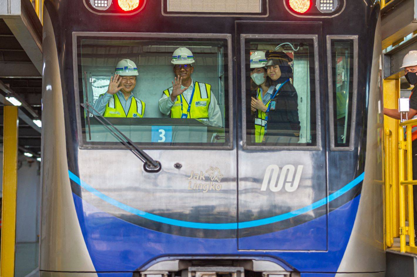 Emperor Naruhito (left) waves during a visit to a site of Jakatra's Mass Rapid Transit system on June 18. | PT. MRT JAKARTA / VIA AFP-JIJI
