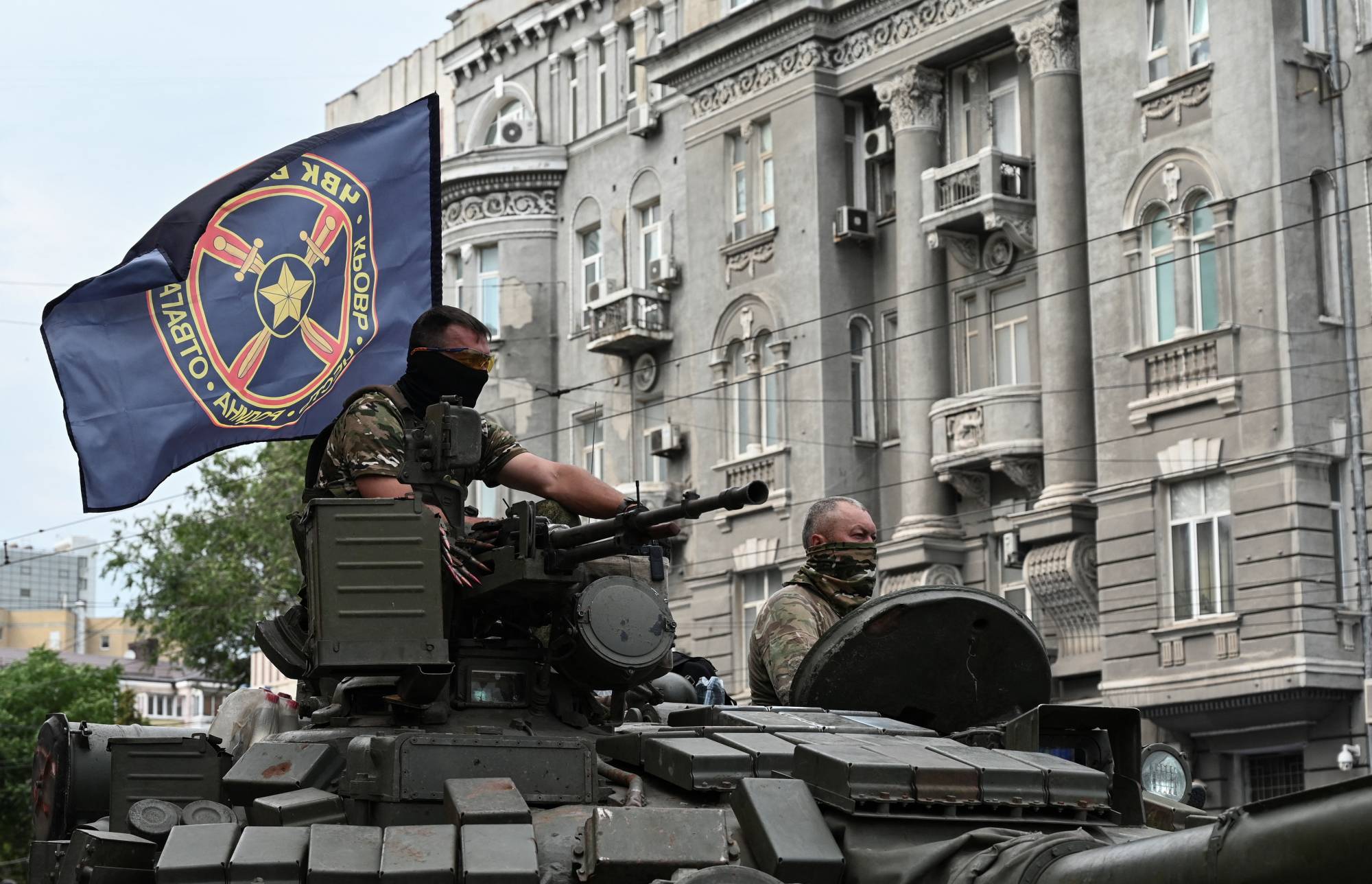 Wagner Group fighters on top of a tank in Rostov-on-Don, Russia, on Saturday | Reuters