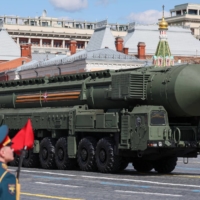 An intercontinental ballistic missile system drives in Red Square during a military parade in Moscow on May 9.  | SPUTNIK / POOL / VIA REUTERS
