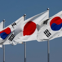 With a warming of ties, South Korea and Japan have an opportunity to work together for global peace and prosperity. | REUTERS