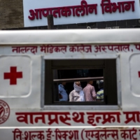 An ambulance outside the entrance to the emergency room at Nalanda Medical College and Hospital in Patna on Thursday. | BLOOMBERG