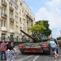 Wagner group mercenaries patrol a street in the city of Rostov-on-Don, Russia, on Saturday, just before their mutiny was called off. | AFP-JIJI