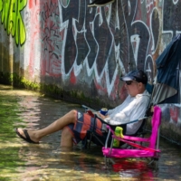 A resident cools off at Barton Creek on Tuesday in Austin, Texas.  | AFP-JIJI