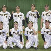 Some of the Hanshin Tigers players voted onto the CL All-Star team via a fan ballot, including Koji Chikamoto (front row, far left), at Koshien Stadium in Nishinomiya, Hyogo Prefecture, on Wednesday | KYODO