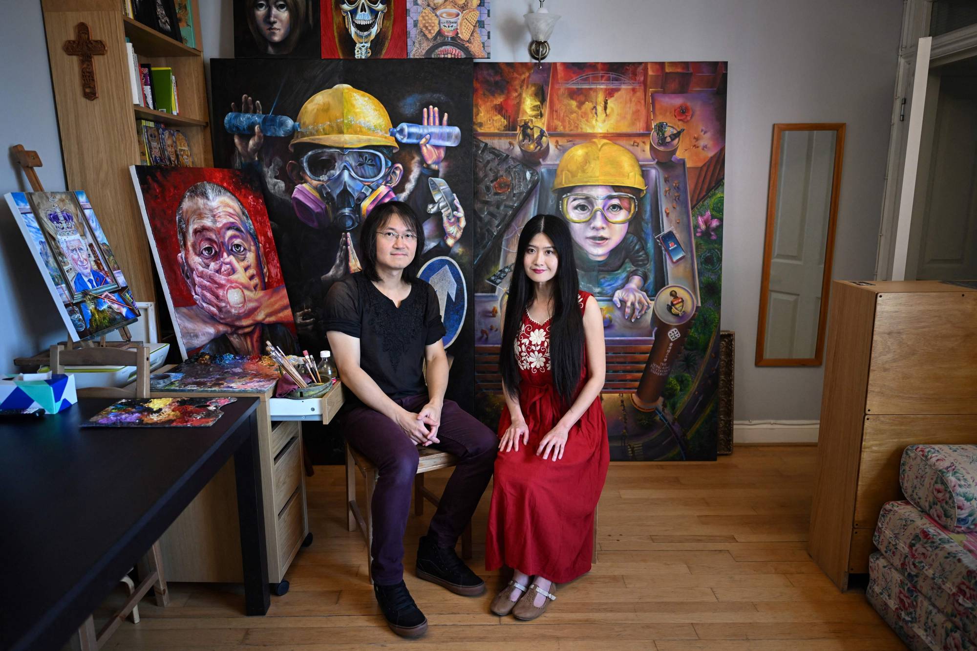 Hong Kong artist duo Lumlong (left) and Lumli at their studio in London on June 15 | AFP-JIJI