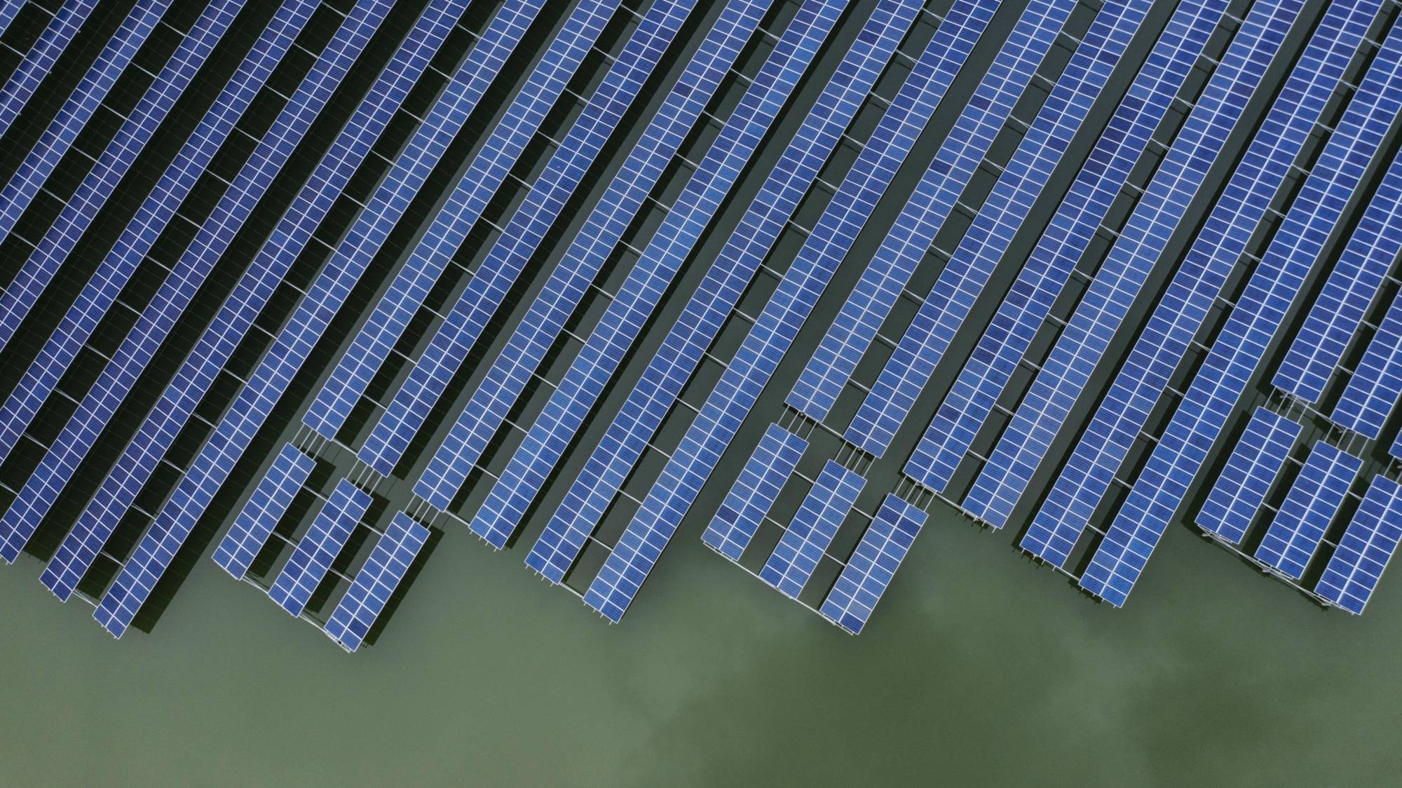 Photovoltaic panels in a floating solar farm in this aerial photograph taken in Zhejiang Province, China, in 2020 | BLOOMBERG