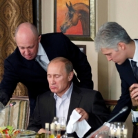 Yevgeny Prigozhin (left), known as “Putin’s chef” because his restaurants were liked by the Russian leader, used that relationship to build a business empire that included the Wagner mercenary group. | REUTERS