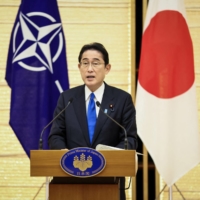 Prime Minister Fumio Kishida speaks during a joint media briefing in Tokyo with NATO Secretary-General Jens Stoltenberg on Jan. 31. | POOL / VIA REUTERS