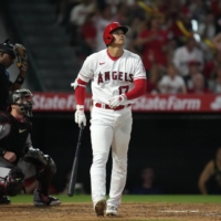 Los Angeles Angels star Shohei Ohtani watches his solo home run in the sixth inning of the team\'s loss to the Diamondbacks.  | USA TODAY / VIA REUTERS 
