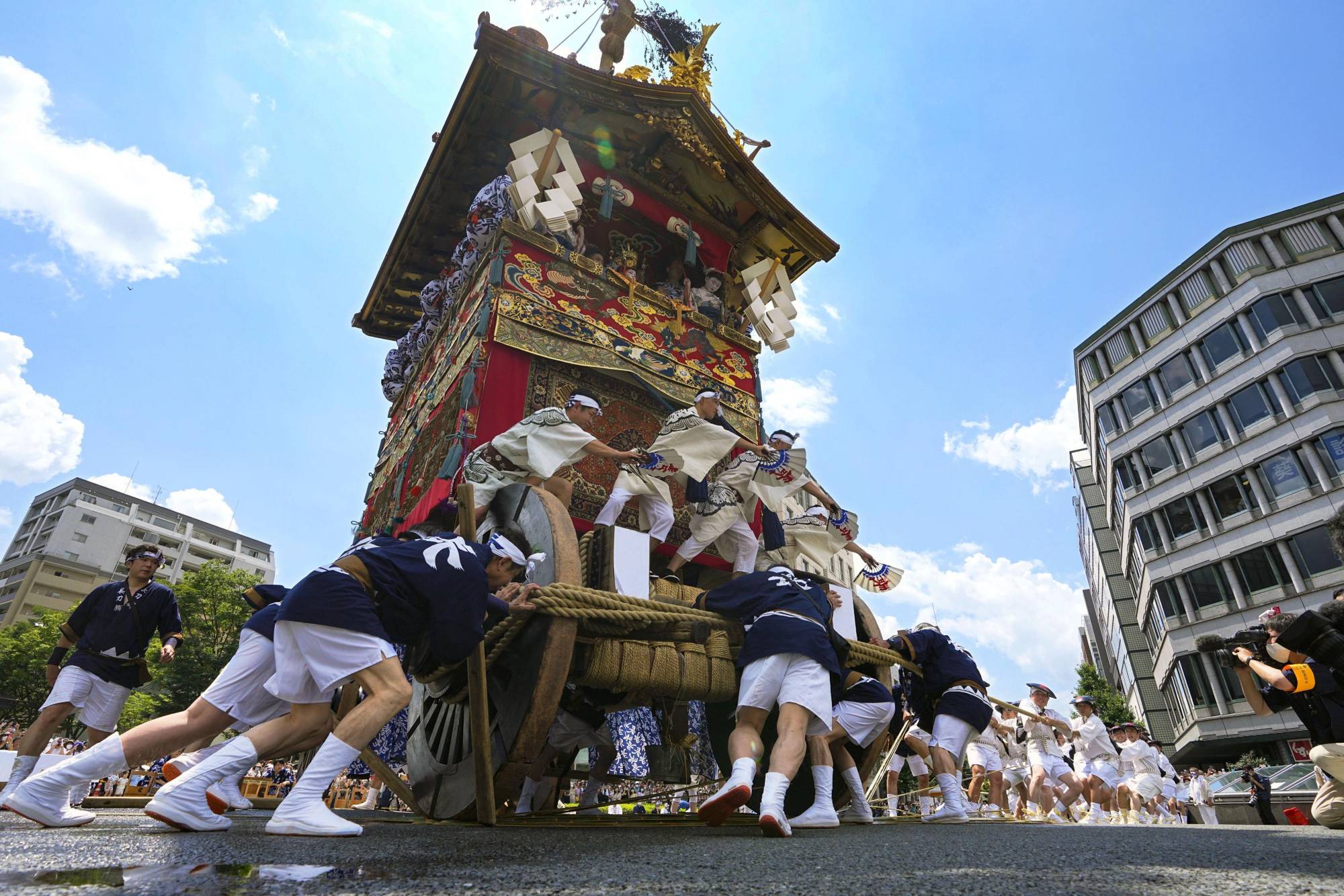 A Yamahoko float is being spun 90 degrees during the Gion Festival last July in Kyoto.  | KYODO 