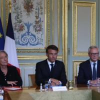French President Emmanuel Macron attends an emergency government meeting in Paris on Sunday after riots erupted for a fifth night in a row. | POOL / VIA AFP-JIJI